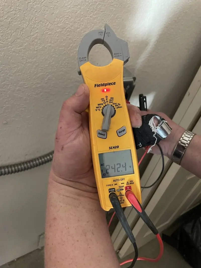Voltage testing with clamp meter during Recessed Lighting Installation in Lower Southampton